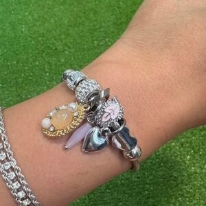 Silver color cable bracelet with heart and crystal charms